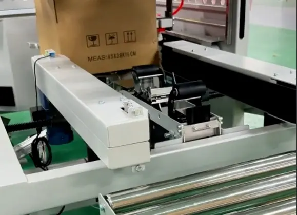  Bottom-Taping-Device