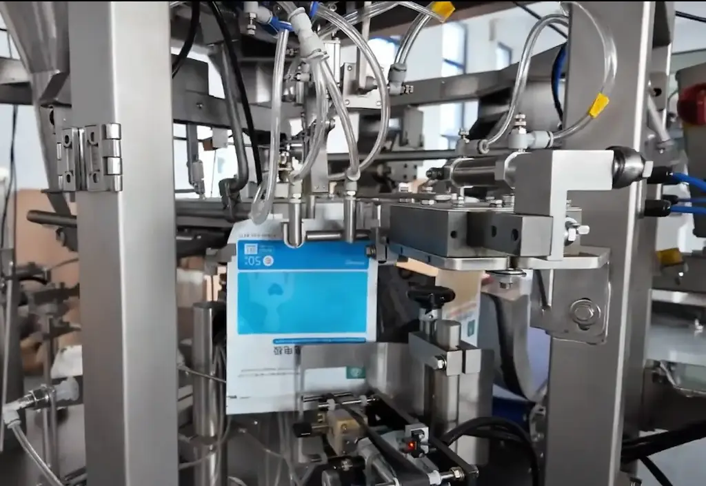 a-flow-meter-dosing-system-delivers-a-precise-volume-of-liquid-into-the-pouch